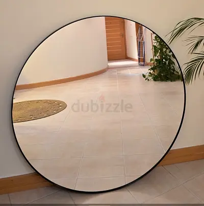 Black frame circular mirror