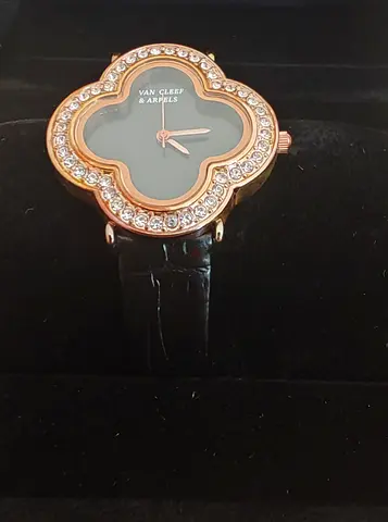 Van Cleef  Arpels style ladies watch with clover dial and crystal bezel