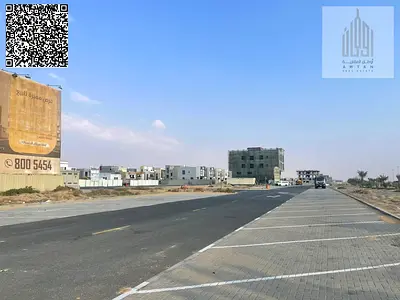 Residential investment land for sale in Al Bahia, Ajman, at a special price. The land is located within the Al Bahia Hills project. The land area is