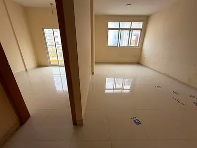 1BR in Al Hamidiya: First Tenant, Balcony View, Central AC, Easy Access to Dubai