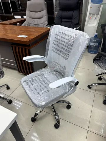 White ergonomic office chair with armrests