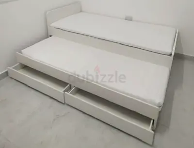Ikea slakt bed frame with under bed and 2 storage drawers underneath with 2 Ikea mattresses is avail