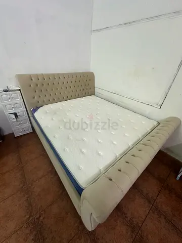 Kings size tufted upholstered bed frame with mattress