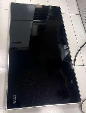 Miele induction cooktop, which is a kitchen appliance used for cooking.