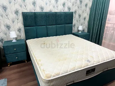 Queen upholstered bed frame with mattress and bedside tables (green)
