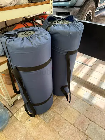 Two rolled self inflating single mattresses - good condition