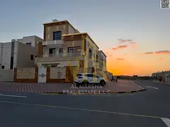 Corner villa for sale in Ajman, two floors and a roof, 6 bedrooms, large area, luxury finishing, pri