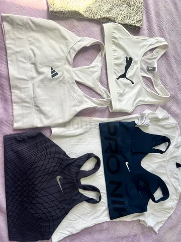 Bundle of 4 Sports Bras (Nike, Adidas, Puma) - Size M