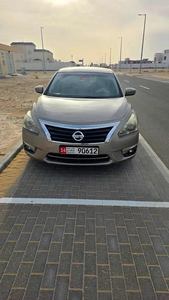 Nissan Altima 2015 — photo 1 of 9