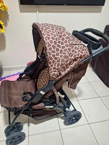 Brown baby stroller/pram in good used condition