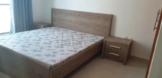 Queen wooden bed frame with mattress and 2 matching bedside tables - light oak