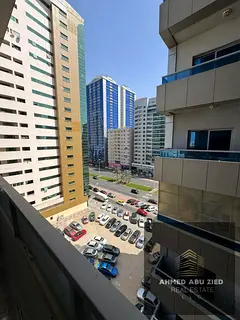 For rent in Ajman Al Rashidiya, 3 rooms and a hall next to Grand Mall, prime location close to all s