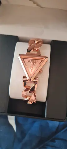 GUESS rose-gold triangular bracelet watch