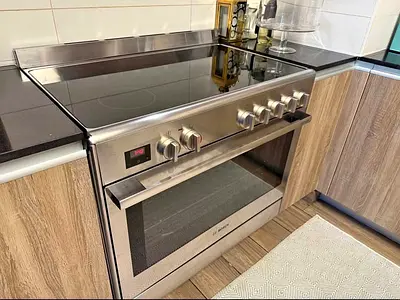 Bosch Stainless Steel Electric Range with Ceramic Hob and Oven - Good Condition