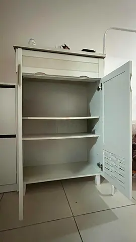 Used by only single person. Wooden Storage Cabinet with Shelves and drawer in a very good condition.