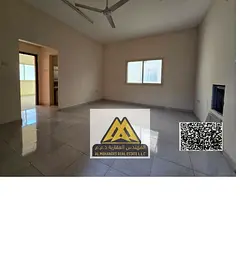 One-bedroom apartment with a living room in Al Alia, Ajman. Spacious, split AC, balcony, AED 28,000
