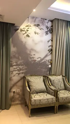 Pair of Classic Upholstered Accent Chairs with Decorative Wall Mural and Curtains