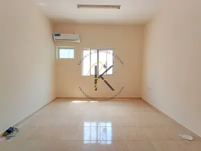 Front of Muwaliah park Neat and clean room full of family building for contact Babar