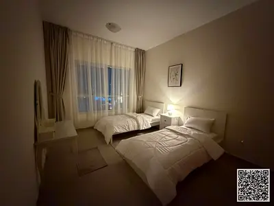 Two-bedroom apartment with a living room (first occupancy), furnished with new furniture, for monthly rent in Ajman - Corniche