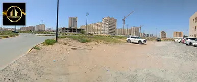 corner land for sale in a prime location in Ajman, Al Yasmin district