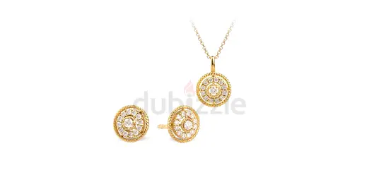 Diamonds within the yellow gold circles of this Bernhard H. Mayer