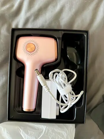 Moving out sale- Never used- Handheld IPL Hair Removal Device - Light Pink, Brand New