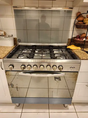 Italian used freestanding stainless steel gas cooker with oven - very good condition Price reduced