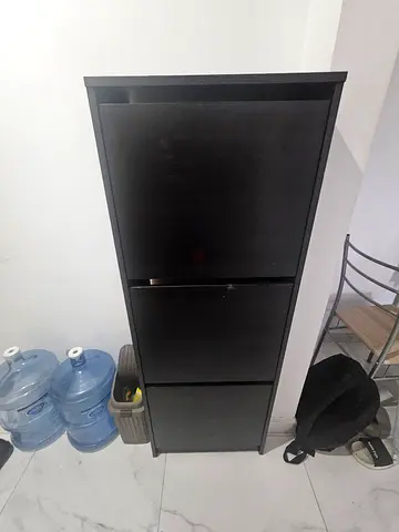 Tall dark wooden storage shoe cabinet with doors - good condition