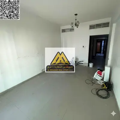 Master Bedroom | Balcony with a Stunning View | Built-in Wardrobes | Central Air Conditioning | Prime Location Close to All Amenities and Near Sharjah