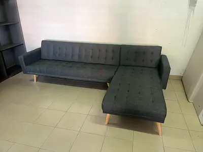 Gray corner sofa bed from the Pan Home collection,