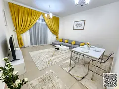 Beautiful furnished one-bedroom apartment with new furniture for monthly rent in Ajman - Al Bustan -