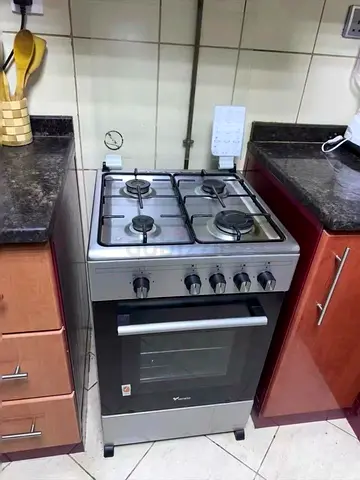 Used 4-Burner Gas Cooker with Oven - Good Working Condition
