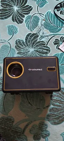 Portable Mini Projector - Used, Compact Wownect Projector