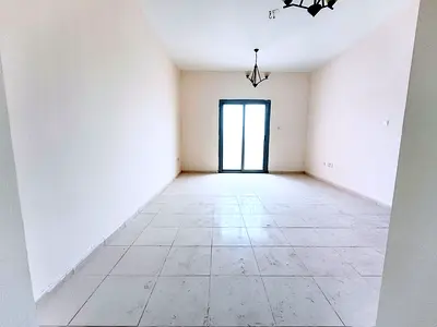 Spacious 1BHK with master bedroom, balcony and covered parking near to school