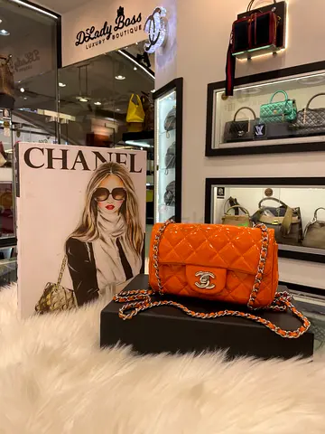 Chanel Orange Quilted Extra Mini Flap Bag (Authentic/PreOwned)