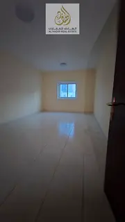 A very large room and hall with a built-in wardrobe, two bathrooms, and a very spacious kitchen.