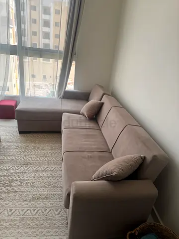 L shape sofa with storage unit for sell in Ajman