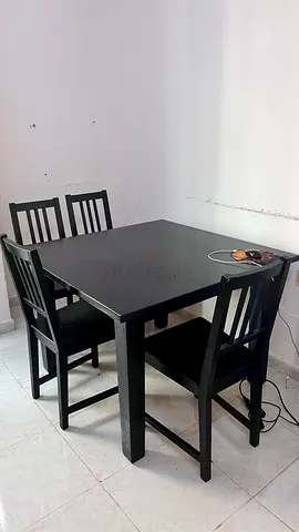 Solid Black Wooden Dining Table with 4 Chairs - Compact Set