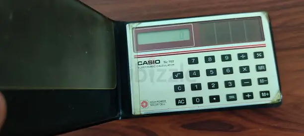 Vintage Casio SL-702 Solar Pocket Calculator in Cover