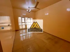 One-bedroom apartment with a living room in Al Mowaihat 3, 2 bathrooms, central AC, spacious layout,