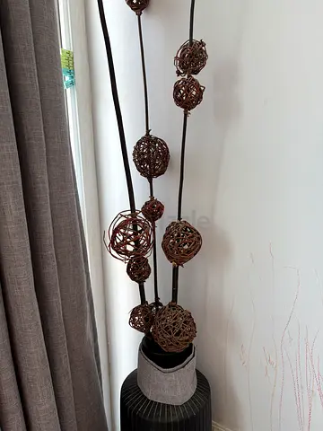 Tall decorative floor vase with woven twig ball stems (brown)