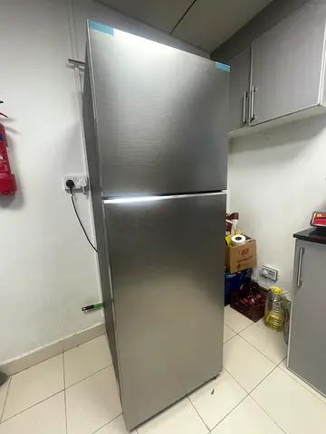 Samsung double door refrigerator for sale, model RT45CG5404S9. Only 1 year old and in excellent work