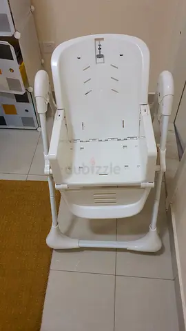 Adjustable white baby booster/high chair - good condition