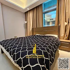 Luxurious one-bedroom apartment with a balcony, gym, and swimming pool, fully furnished, for monthly