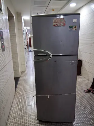 Used Silver Double-Door Refrigerator - Good Working Condition