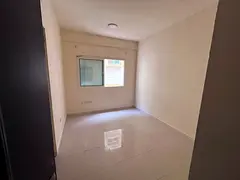 Studio apartment for annual rent with a separate kitchen, central air conditioning, and a prime loca