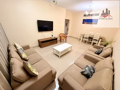 Sharjah, Al Taawun area: Two bedrooms, living room, kitchen, two bathrooms, and a balcony. Super deluxe furnishings. Behind D2D, on the Dubai exit. Pr