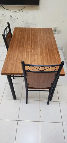 Urgent sale - Small wooden dining table with 2 metal-frame chairs - good condition
