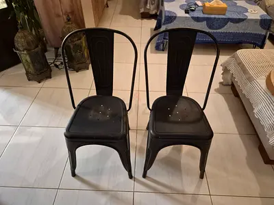2 Black Tolix-style metal dining chairs - used, sturdy