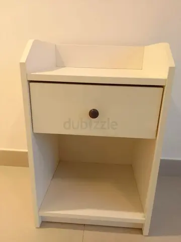 White bedside table with drawer and open shelf good condition.  2 for 130 AED, original price e 199